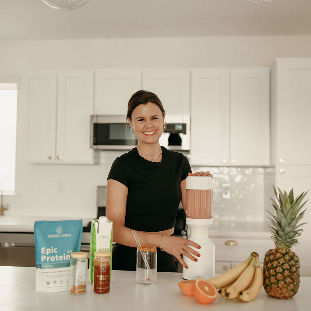 Michelle making a smoothie in her kitchen