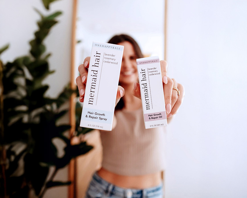 Michelle holding Mermaid Hair products from Clean Beauty by OHK